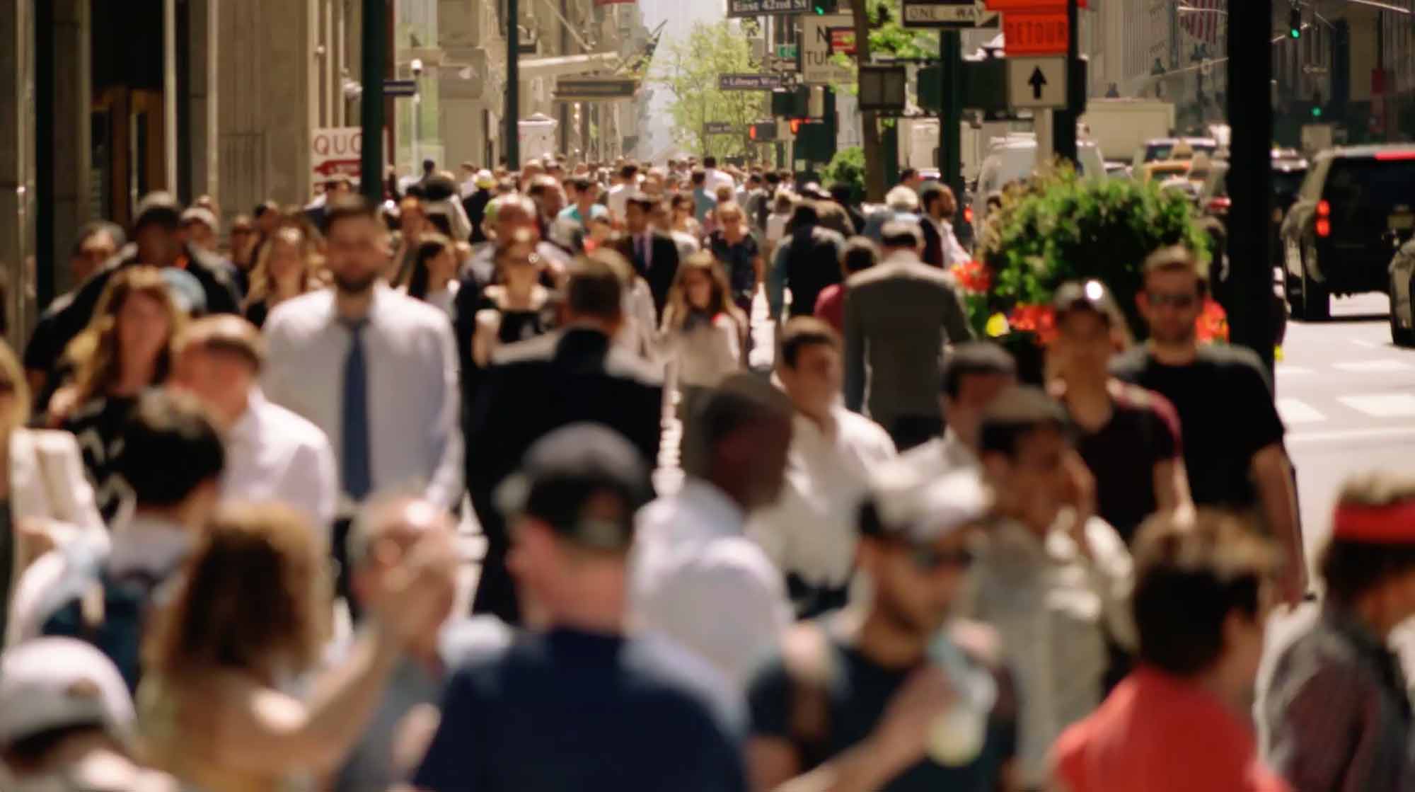 Selection of athletic shoes displayed on a glass shelf
